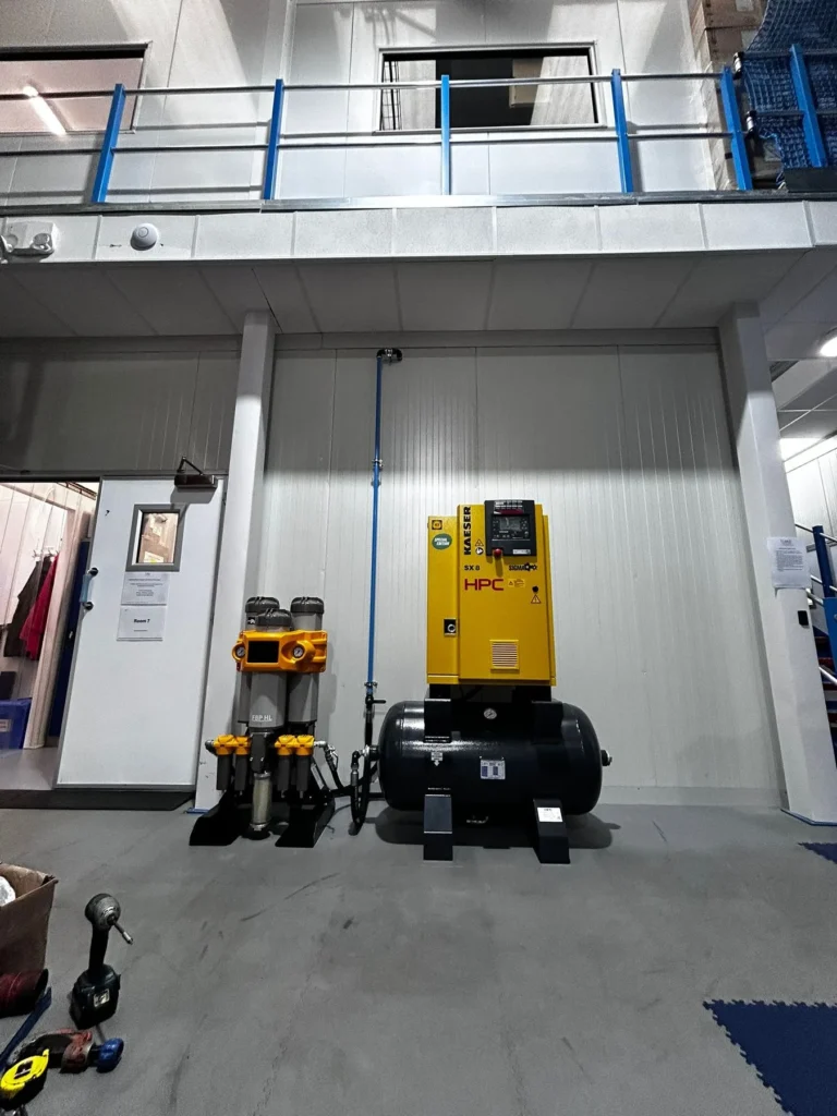 HPC screw compressor, air receiver and filtration installed in a commercial industrial unit