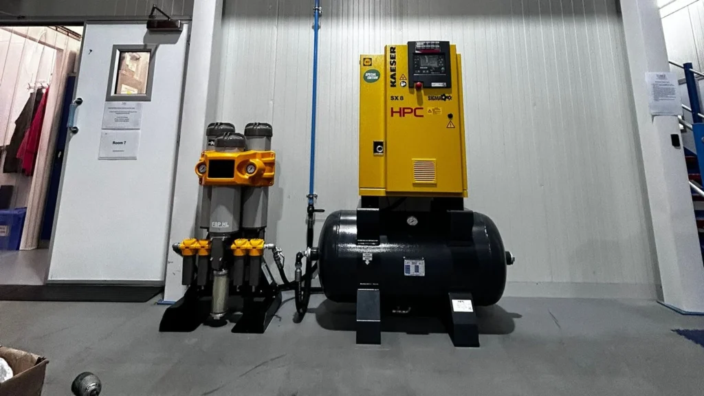 HPC screw compressor, air receiver and filtration installed in a commercial industrial unit