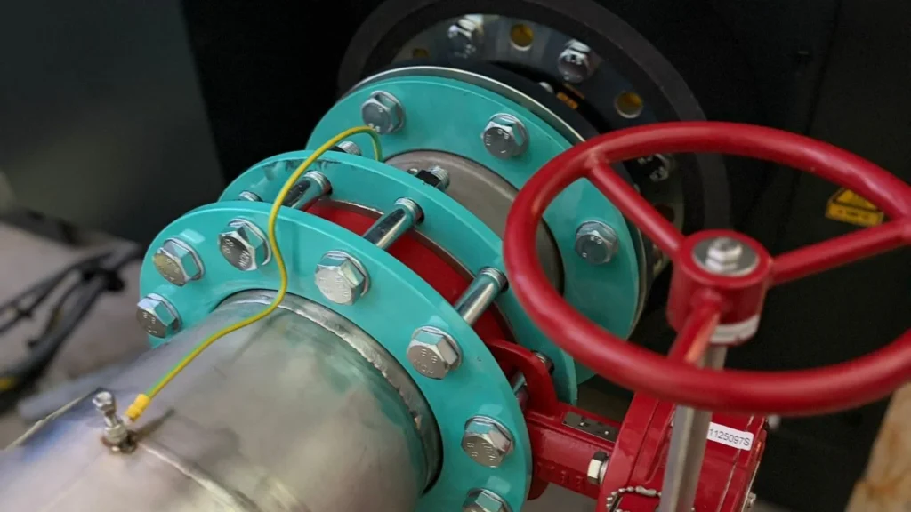 Flanged gate valve with gearbox actuator installed on a large-bore mechanical services main